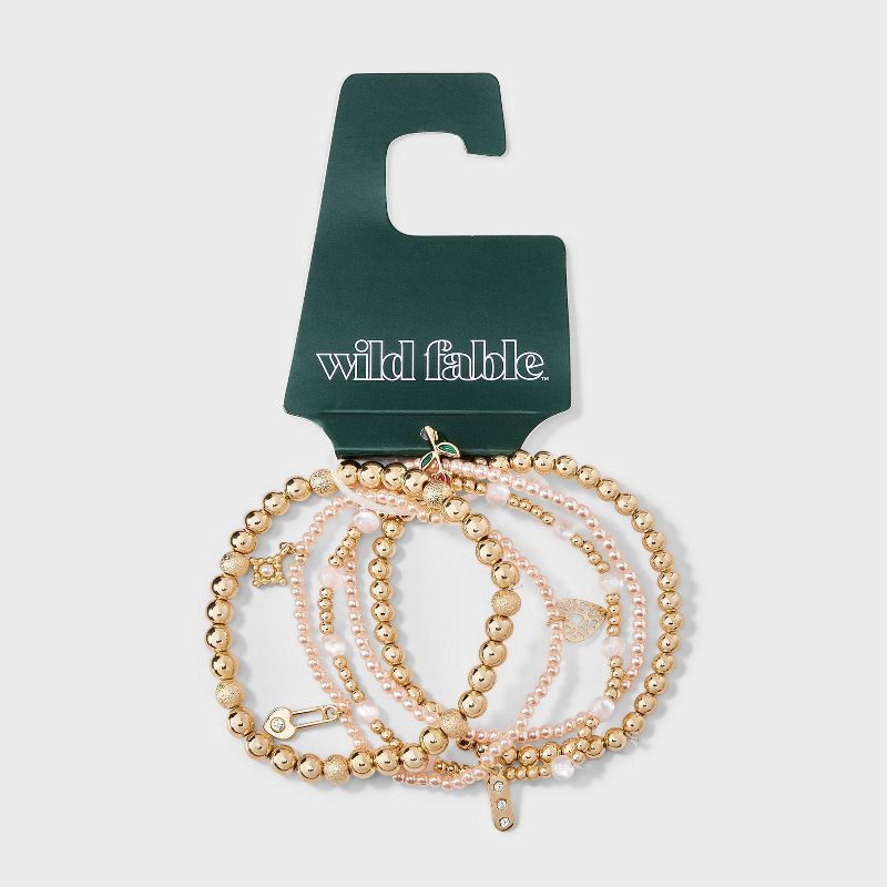 slide 4 of 5, Mixed Beaded and Charm Bracelet Set 5pc - Wild Fable™ Light Pink/Gold, 5 ct