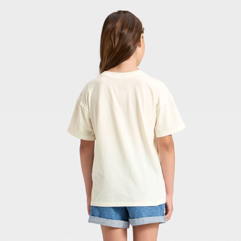 slide 3 of 4, Girls' Short Sleeve Oversized Rainbow Ice Cream Graphic T-Shirt - Cat & Jack™ Cream L, 1 ct