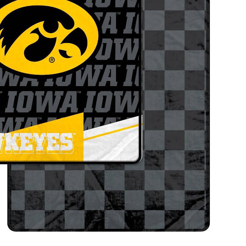 slide 2 of 3, NCAA Iowa Hawkeyes Diagonal Ghost Checker Double Sided Blanket, 1 ct