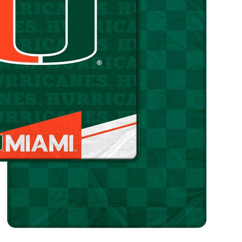 slide 2 of 3, NCAA Miami Hurricanes Diagonal Ghost Checker Double Sided Blanket, 1 ct