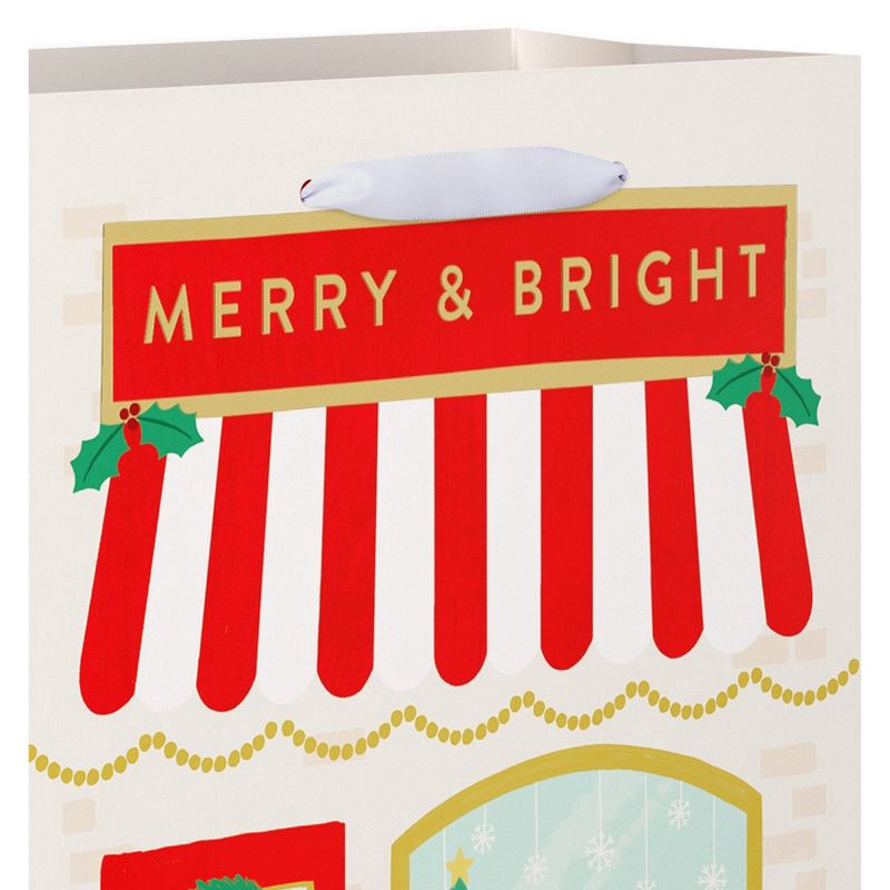 slide 3 of 5, American Greetings 13" Large Christmas Gift Bag Merry and Bright Storefront, 1 ct
