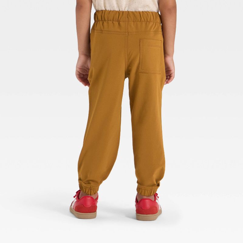 slide 2 of 3, Toddler Boys' Quick Dry Pants - Cat & Jack™ Brown 12M, 1 ct