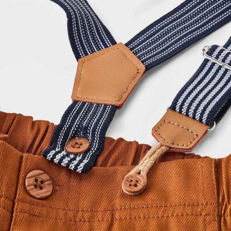 slide 4 of 4, Baby Boys' 2pc Disney Winnie the Pooh Long Sleeve Bodysuit & Pants Suspender Set - Brown 6-9M, 2 ct