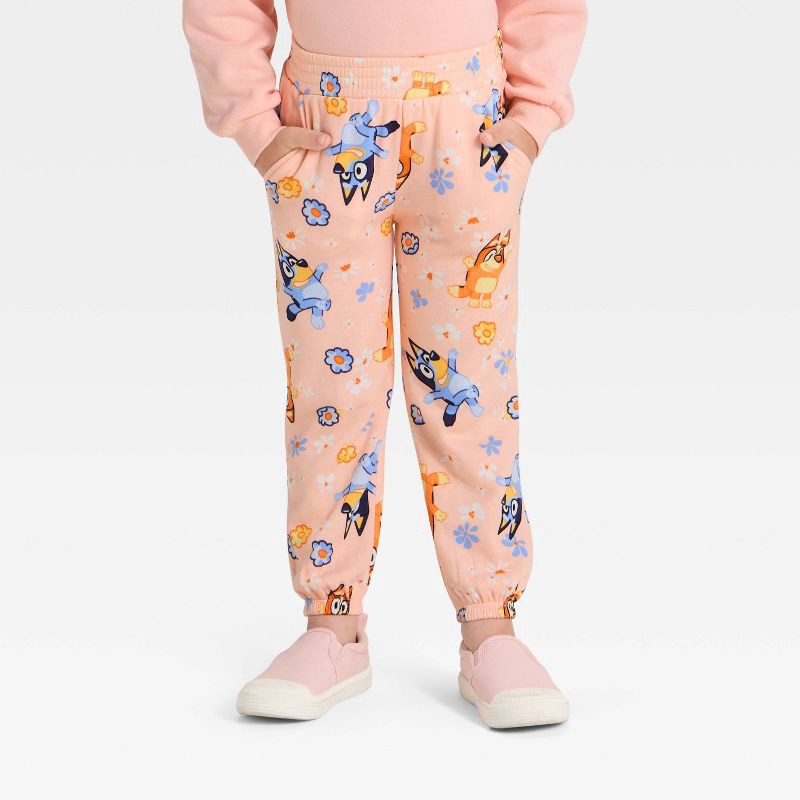slide 4 of 4, Toddler Girls' 2pc Bluey Bingo Floral Cozy Fleece Sweatshirt with Tulle Bow and Pants Set - Peach Orange 5T, 2 ct