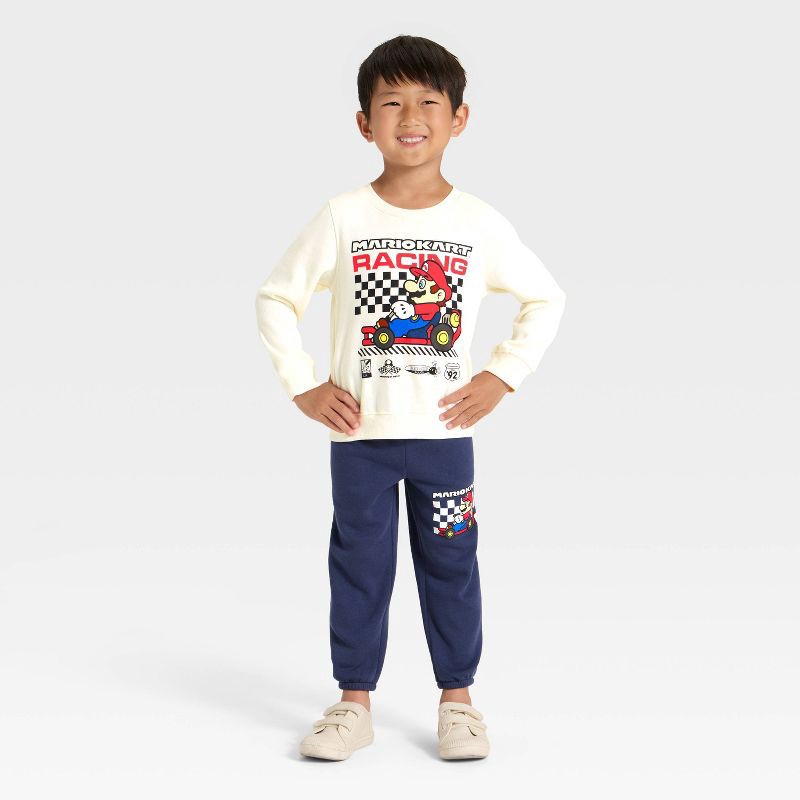 slide 1 of 4, Toddler Boys' 2pc Nintendo Mario Kart Fleece Pullover and Bottom Set - Blue/Ivory 5T, 2 ct