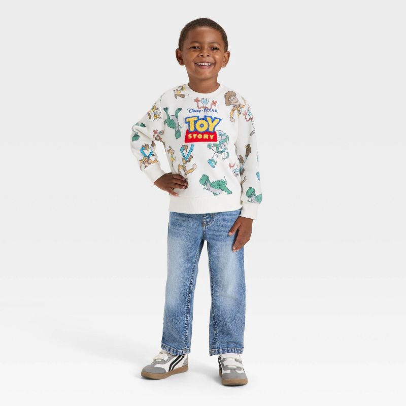 slide 4 of 4, Toddler Boys' Disney Toy Story Fleece Sweatshirt - Off-White 5T, 1 ct