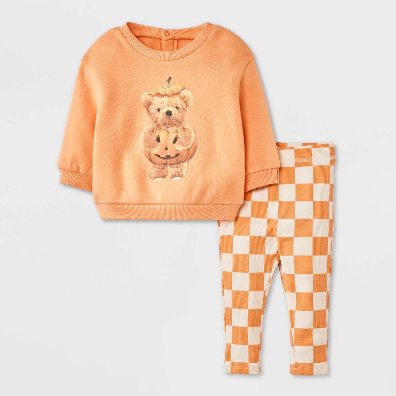 slide 1 of 4, Grayson Mini Baby 2pc Teddy Bear Halloween Pumpkin Pullover & Checkered Bottom Set - Orange 18M, 2 ct