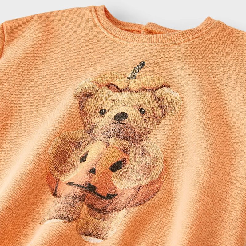 slide 4 of 4, Grayson Mini Baby Teddy Bear Halloween Pumpkin Long Sleeve Romper - Orange 18M, 1 ct