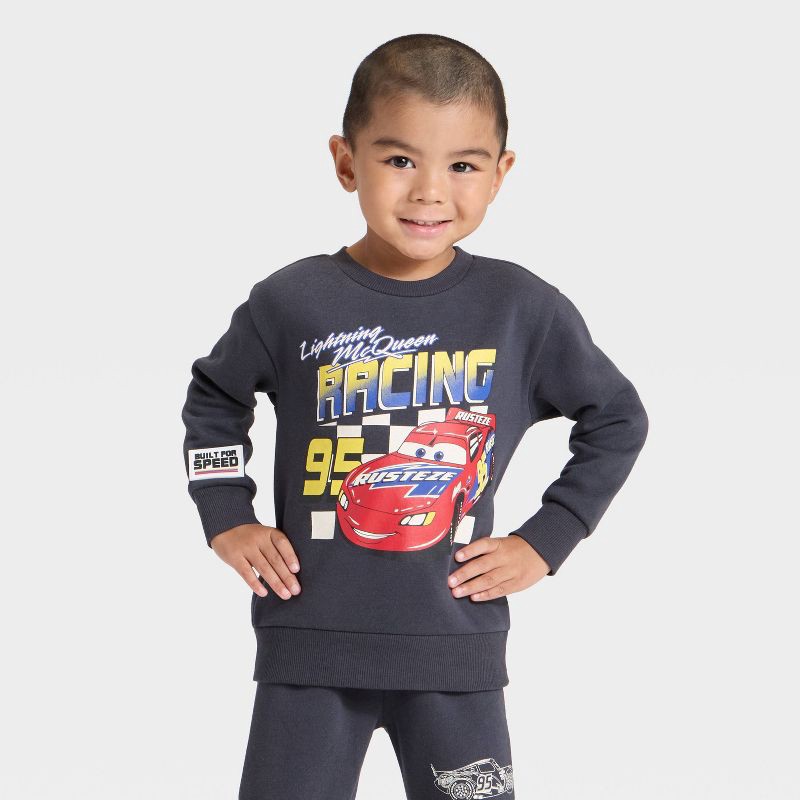 slide 3 of 4, Toddler Boys' 2pc Disney Cars Lightning McQueen Racing Fleece Pullover and Bottom Set - Black 3T, 2 ct