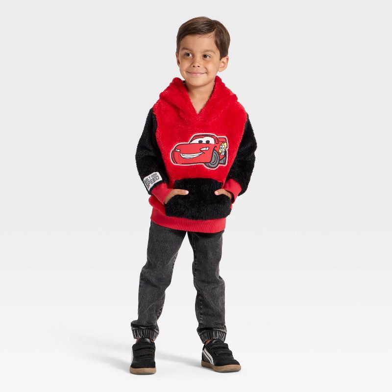 slide 3 of 3, Toddler Boys' Disney Cars Lightning McQueen Racing Hooded Pullover Sweatshirt - Red 5T, 1 ct