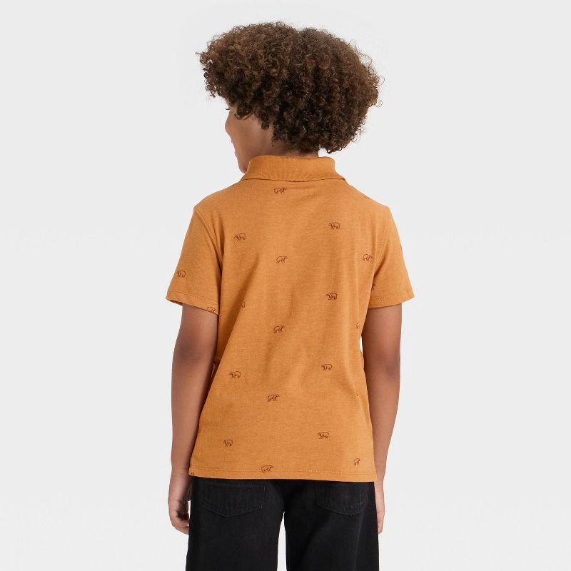 slide 2 of 3, Boys' Short Sleeve Printed Polo Shirt - Cat & Jack™ Orange L, 1 ct