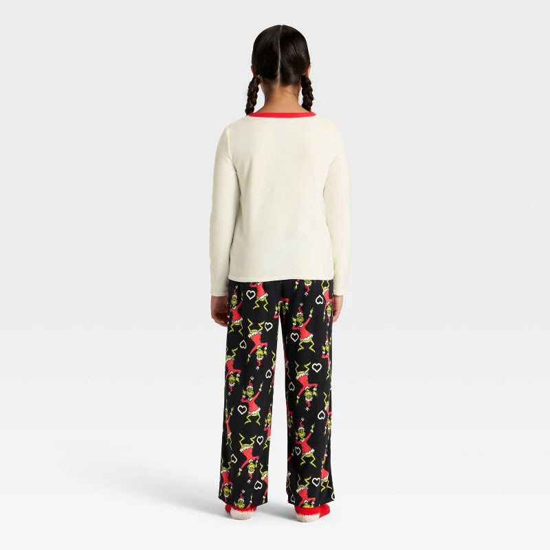 slide 2 of 5, Girls' 2pc The Grinch Christmas Cozy Pajama Set with Socks - Black S, 2 ct