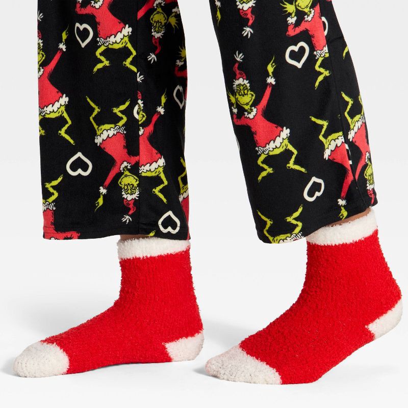 slide 5 of 5, Girls' 2pc The Grinch Christmas Cozy Pajama Set with Socks - Black M, 2 ct