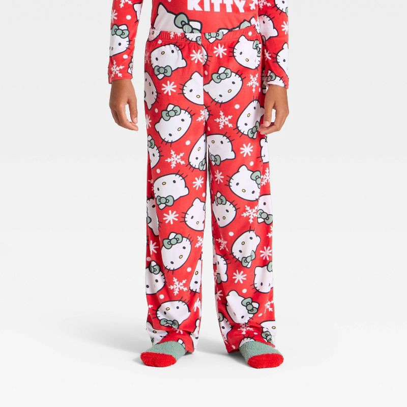 slide 4 of 5, Girls' 2pc Hello Kitty Holiday Cozy Pajama Set with Socks - Red M, 2 ct