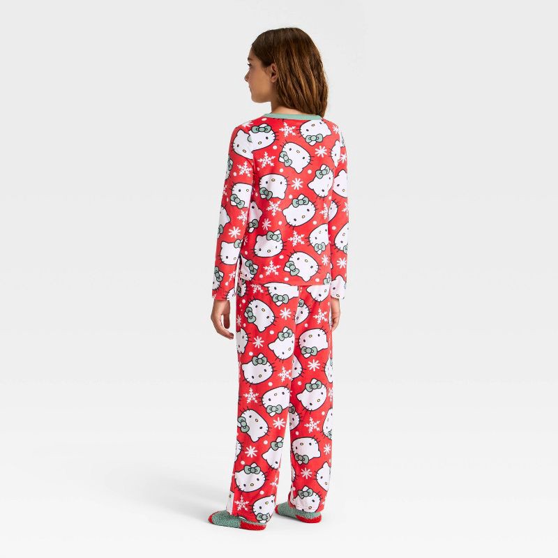 slide 2 of 5, Girls' 2pc Hello Kitty Holiday Cozy Pajama Set with Socks - Red L, 2 ct
