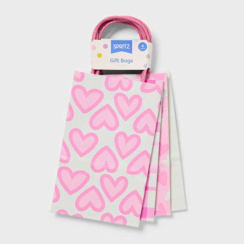 slide 3 of 3, 4ct Valentine's Day M/L Junior Triple Heart Toss Plaid Tote Pink - Spritz™, 4 ct