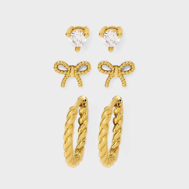 slide 1 of 3, 14K Gold Plated Cubic Zirconia Bow Stud and Twist Hoop Earring Set 3pc - A New Day™ Gold, 3 ct