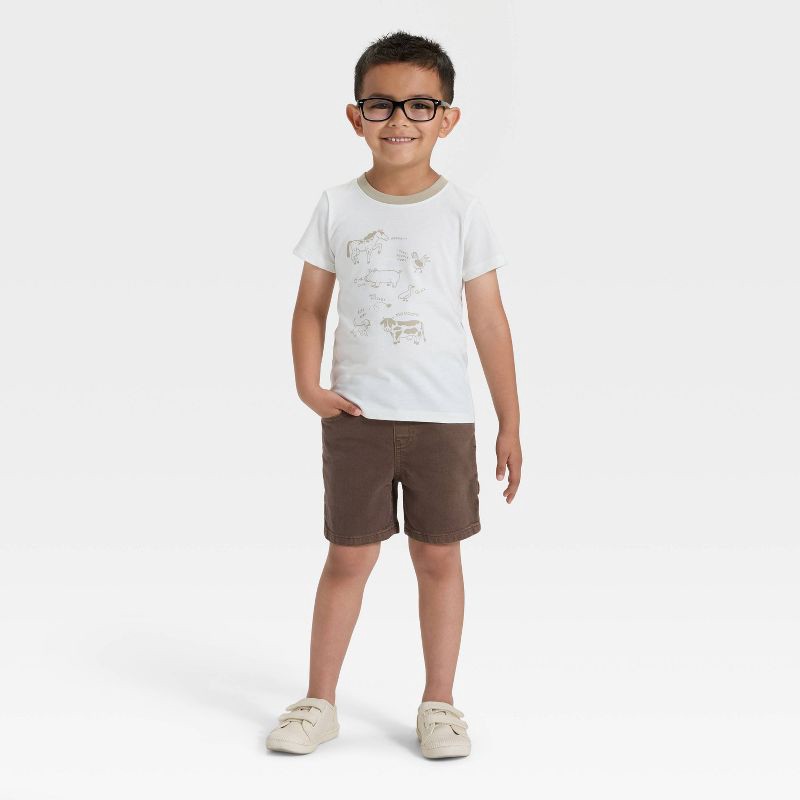 slide 3 of 4, Toddler Boys' Short Sleeve Farm Animals Graphic T-Shirt - Cat & Jack™ Off-White 5T, 1 ct