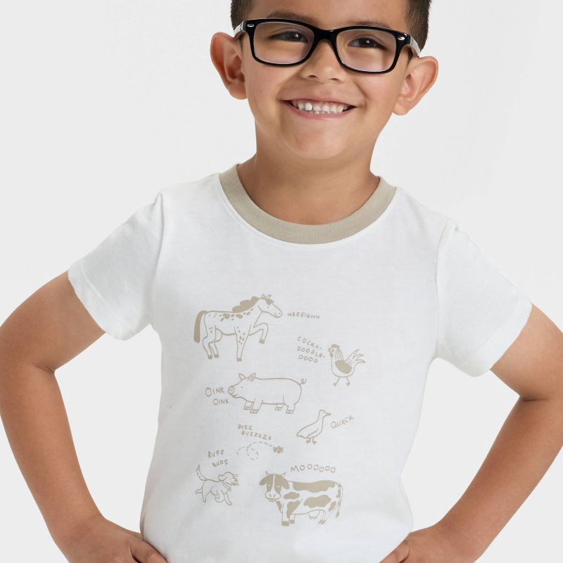 slide 3 of 4, Toddler Boys' Short Sleeve Farm Animals Graphic T-Shirt - Cat & Jack™ Off-White 2T, 1 ct