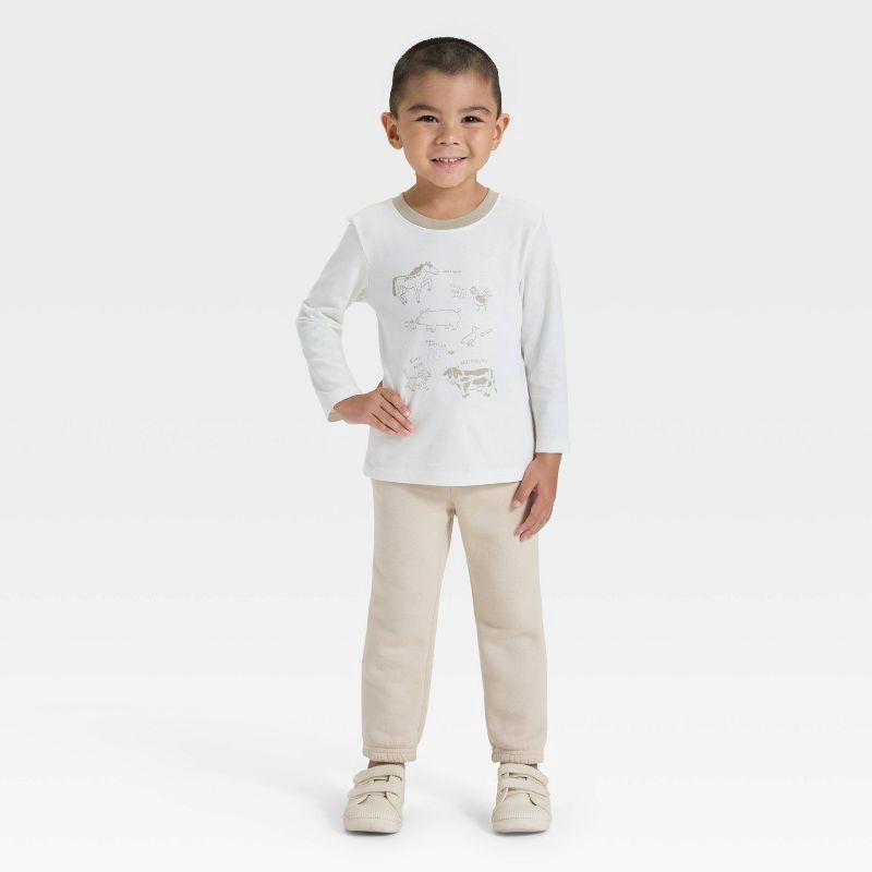 slide 4 of 4, Toddler Boys' Long Sleeve Animals Graphic T-Shirt - Cat & Jack™ Off-White 5T, 1 ct