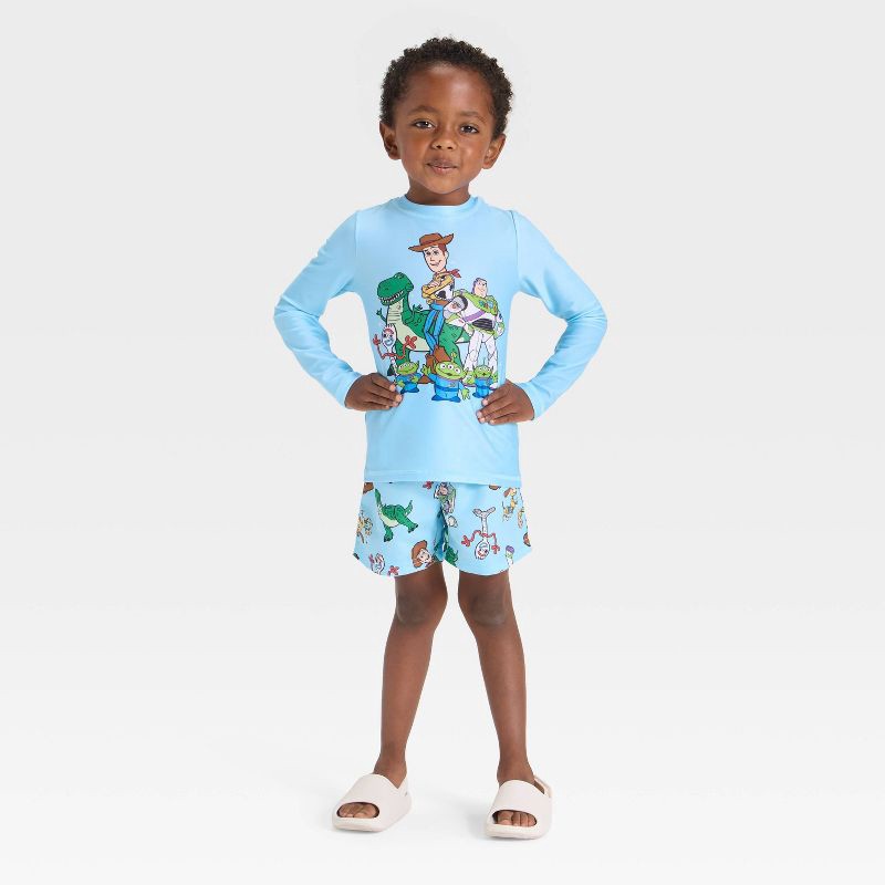 slide 1 of 3, Toddler Boys' Disney Toy Story Long Sleeve Rash Guard Swim Set - Blue 12M, 1 ct