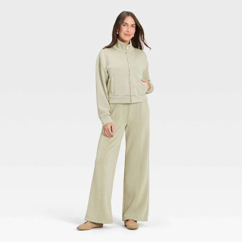 slide 3 of 4, Women's Sandwash Zip-Up - A New Day™ Light Green L, 1 ct