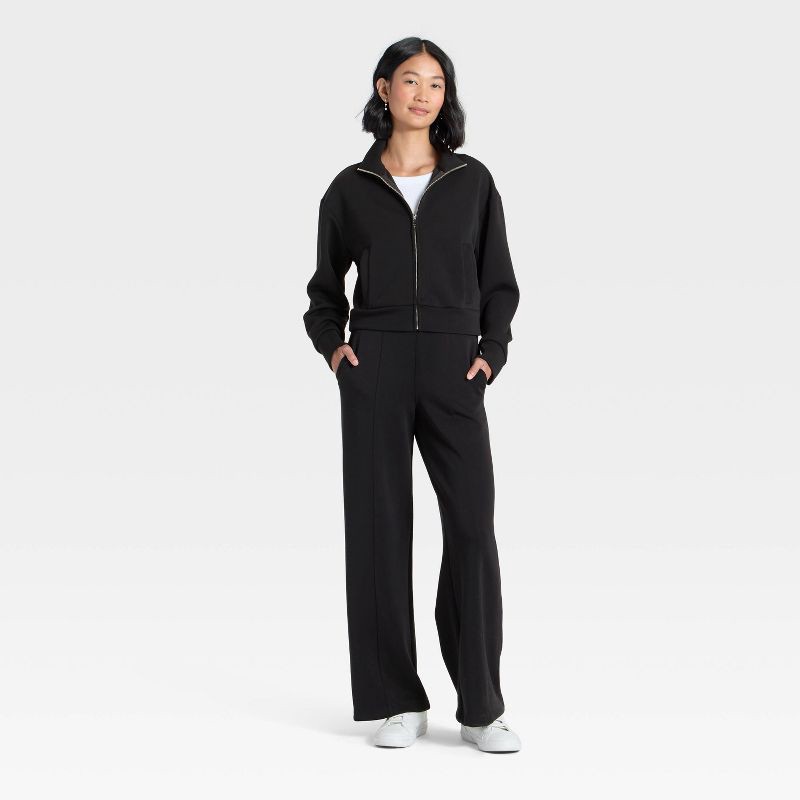 slide 3 of 4, Women's Sandwash Zip-Up - A New Day™ Black S, 1 ct