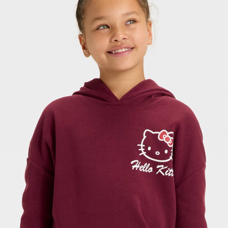 slide 2 of 4, Hello Kitty Girls' Hooded Cherry Bow Oversized Pullover Sweatshirt - Red XL, 1 ct