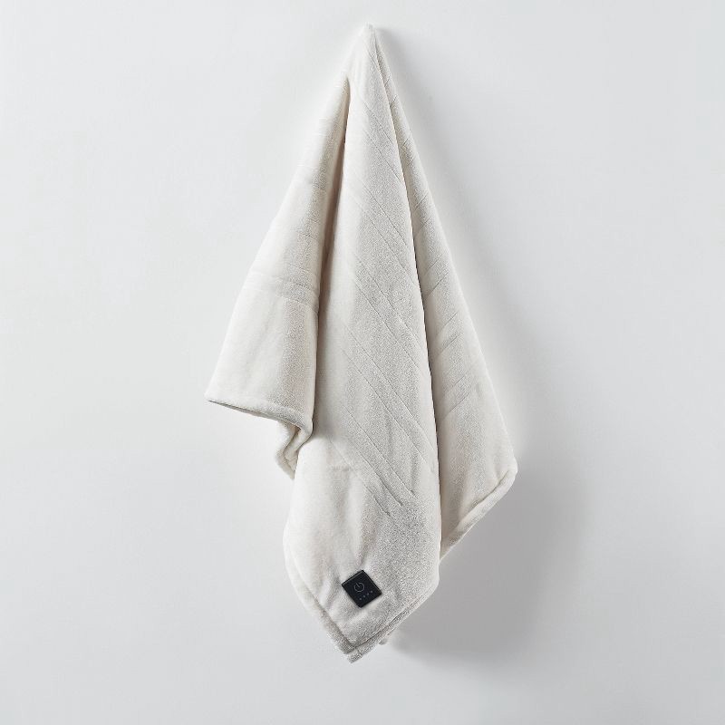 slide 3 of 5, Brookstone Heated Solid Plush Throw Ivory, 1 ct
