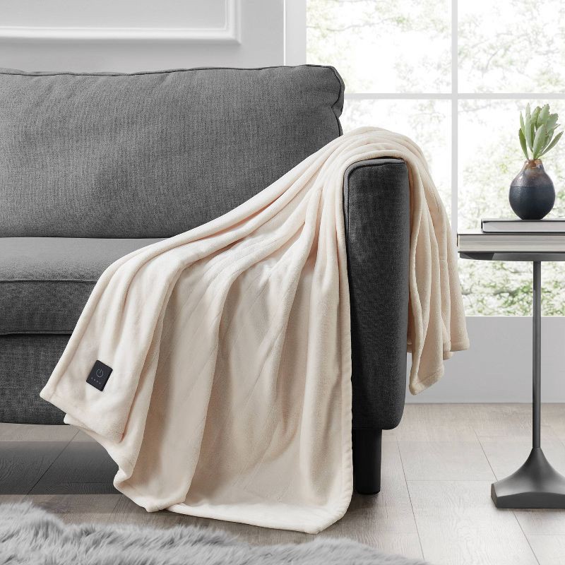 slide 1 of 5, Brookstone Heated Solid Plush Throw Ivory, 1 ct