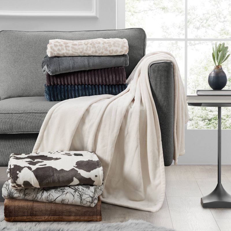 slide 5 of 5, Brookstone Heated Solid Ribbed Plush Throw Navy, 1 ct