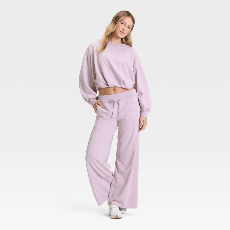 slide 2 of 3, Women's Bubble Hem Long Sleeve Top - JoyLab™ Lavender S, 1 ct