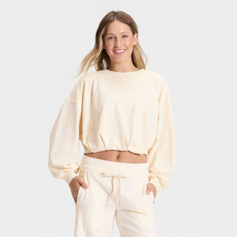 slide 1 of 3, Women's Bubble Hem Long Sleeve Top - JoyLab™ Cream L, 1 ct