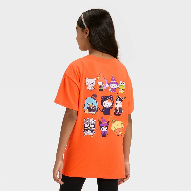 slide 1 of 4, Hello Kitty Girls' Short Sleeve Halloween Friends Graphic T-Shirt - Orange S, 1 ct