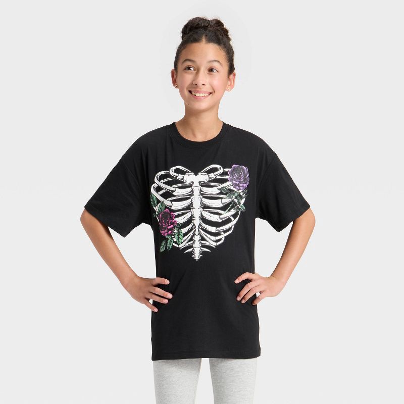 slide 1 of 4, Mad Engine Girls' Floral Ribcage Short Sleeve Oversized Graphic T-Shirt - Black M, 1 ct