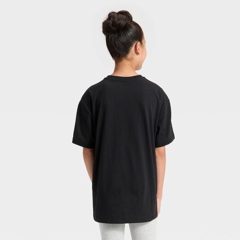 slide 2 of 4, Mad Engine Girls' Floral Ribcage Short Sleeve Oversized Graphic T-Shirt - Black XL, 1 ct