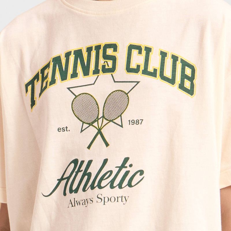 slide 4 of 4, Mad Engine Girls' Athletic Tennis Club Short Sleeve Oversized Graphic T-Shirt - Ivory L, 1 ct