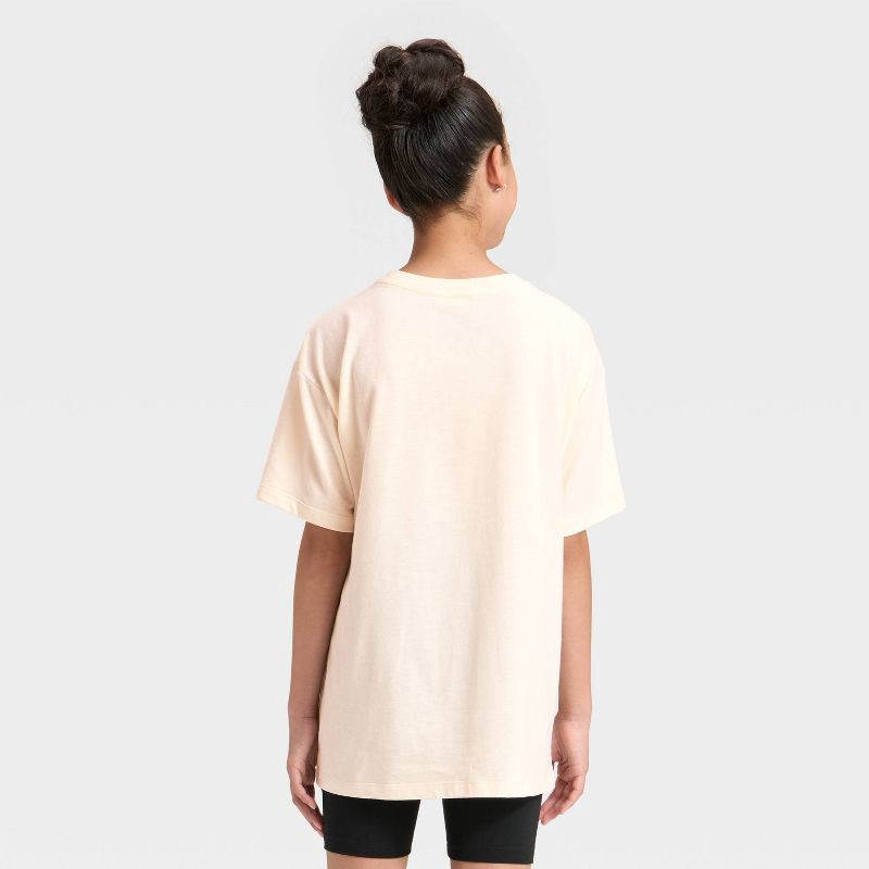 slide 3 of 4, Mad Engine Girls' Athletic Tennis Club Short Sleeve Oversized Graphic T-Shirt - Ivory XL, 1 ct