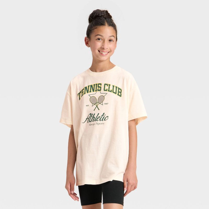 slide 1 of 4, Mad Engine Girls' Athletic Tennis Club Short Sleeve Oversized Graphic T-Shirt - Ivory XL, 1 ct