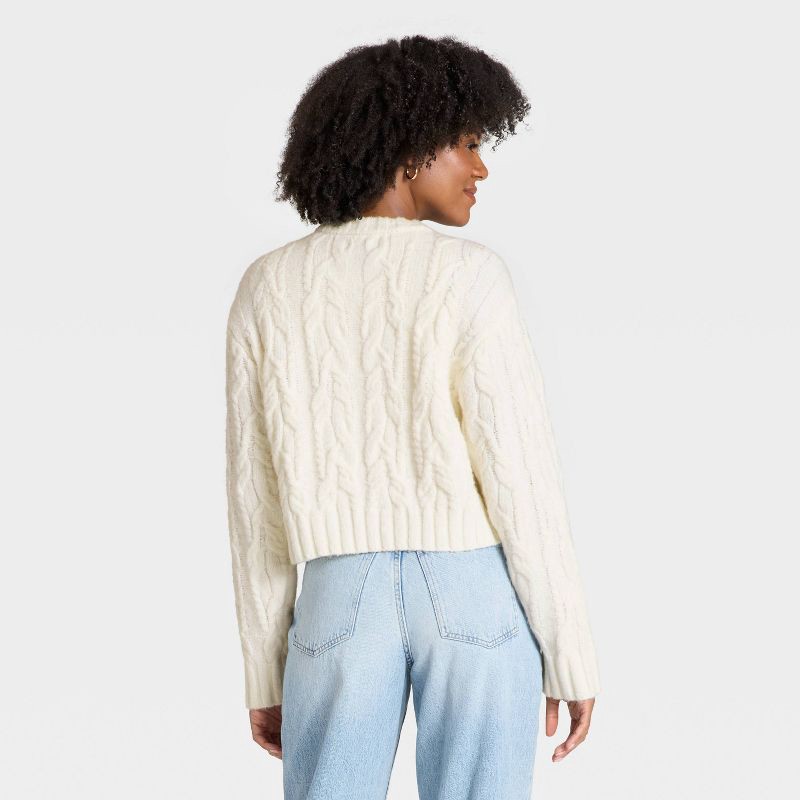 slide 2 of 3, Women's Long Sleeve Cozy Cable Crewneck Pullover Sweater - Universal Thread™ Cream L, 1 ct