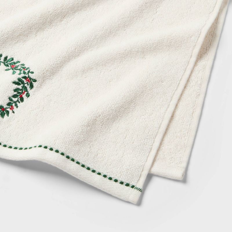 slide 3 of 4, 2pk Holly Wreath Christmas Hand Towels Cream - Threshold™, 2 ct