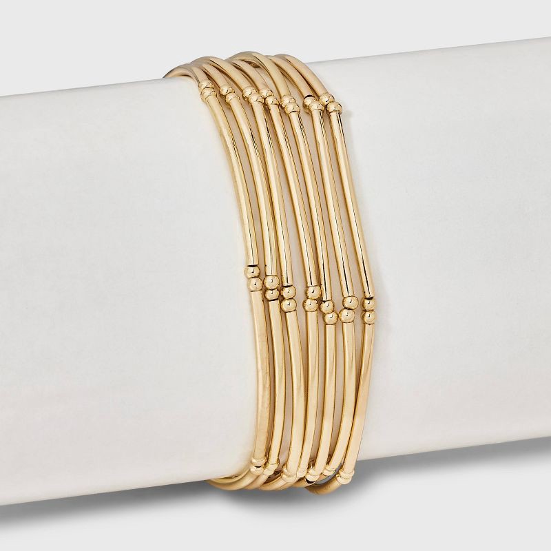 slide 2 of 4, Tube Stretch Bracelet Set 7pc - Universal Thread™ Gold, 7 ct