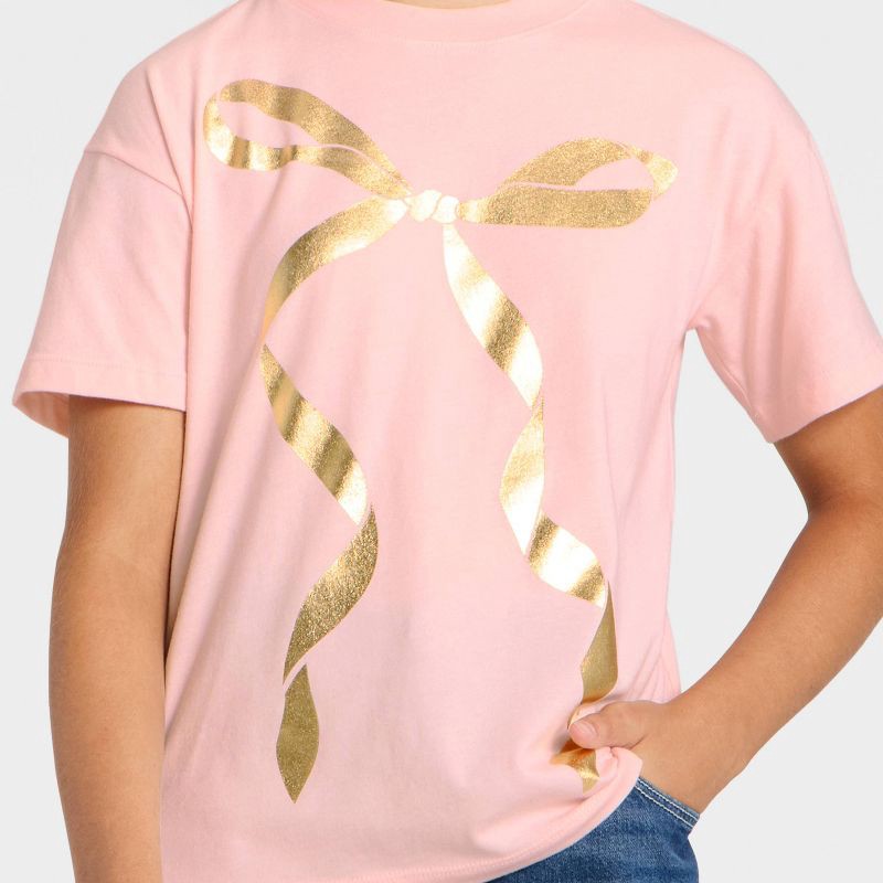 slide 2 of 4, Girls' Short Sleeve Bow Oversized Graphic T-Shirt - Cat & Jack™ Light Pink L, 1 ct