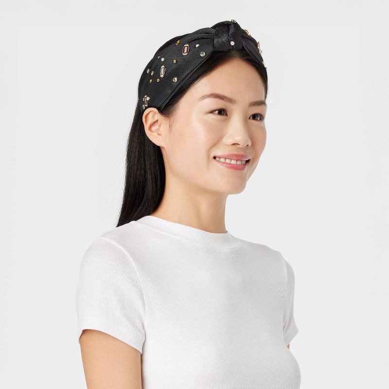 slide 3 of 3, Football Game Day Embellished Top Knot Headband - Universal Thread™ Black, 1 ct