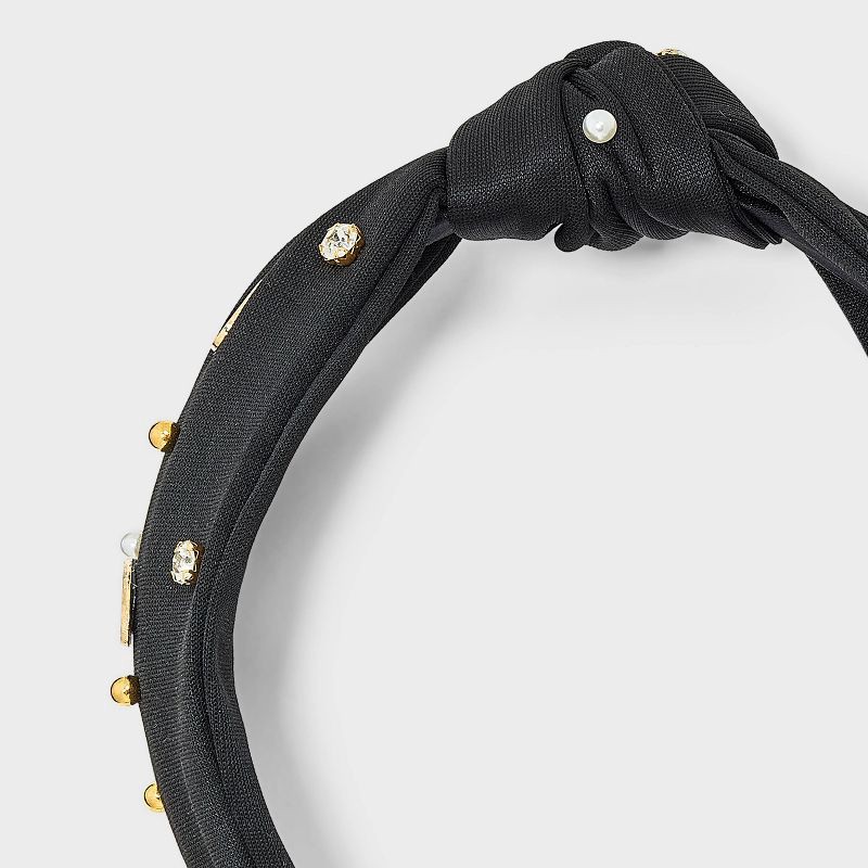 slide 2 of 3, Football Game Day Embellished Top Knot Headband - Universal Thread™ Black, 1 ct