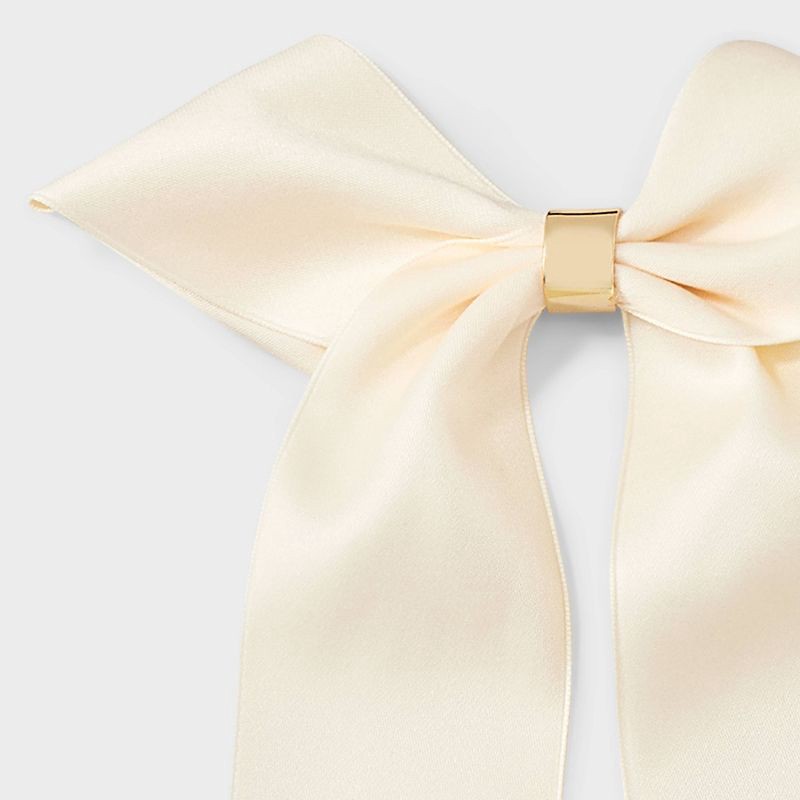 slide 3 of 3, Bow with Gold Center Hair Clip - A New Day™ Ivory, 1 ct