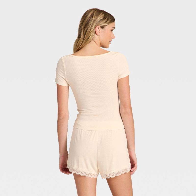slide 2 of 3, Women's Ribbed Short Sleeve Shirt and Shorts Pajama Set - Auden™ Cream XS, 1 ct