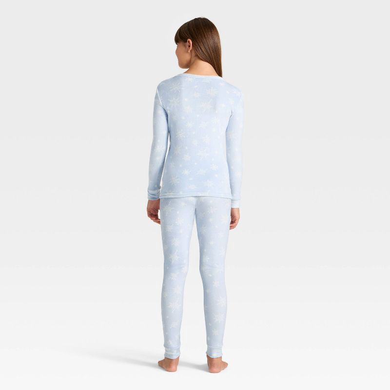 slide 2 of 5, Kids' 2pc Snowflakes Long Sleeve Holiday Snuggly Soft Pajama Set - Cat & Jack™ Blue 14, 2 ct