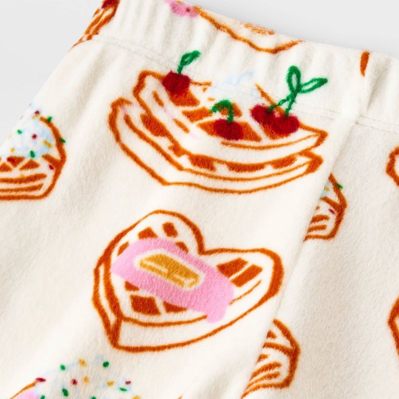 slide 4 of 4, Toddler 2pc Waffles Snuggly Soft Pajama Set - Cat & Jack™ Cream 2T, 2 ct