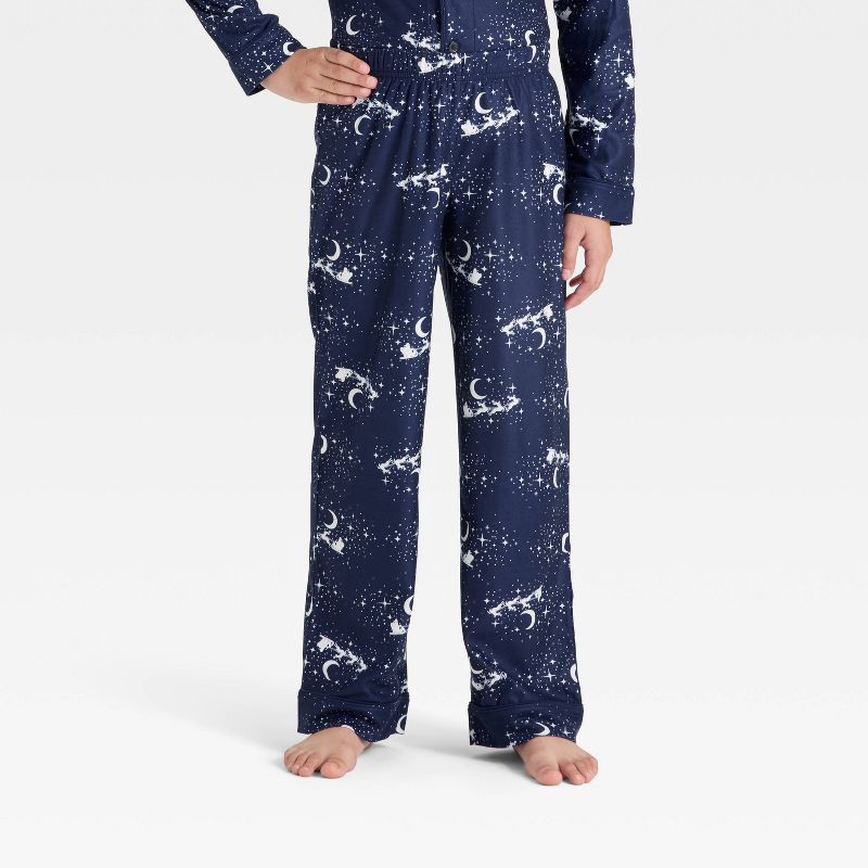 slide 4 of 4, Boys' 2pc Christmas Santa Sleigh Long Sleeve Button-Down Pajama Set - Cat & Jack™ Navy Blue XS, 2 ct